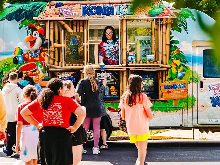 Kona Ice truck serving guests
