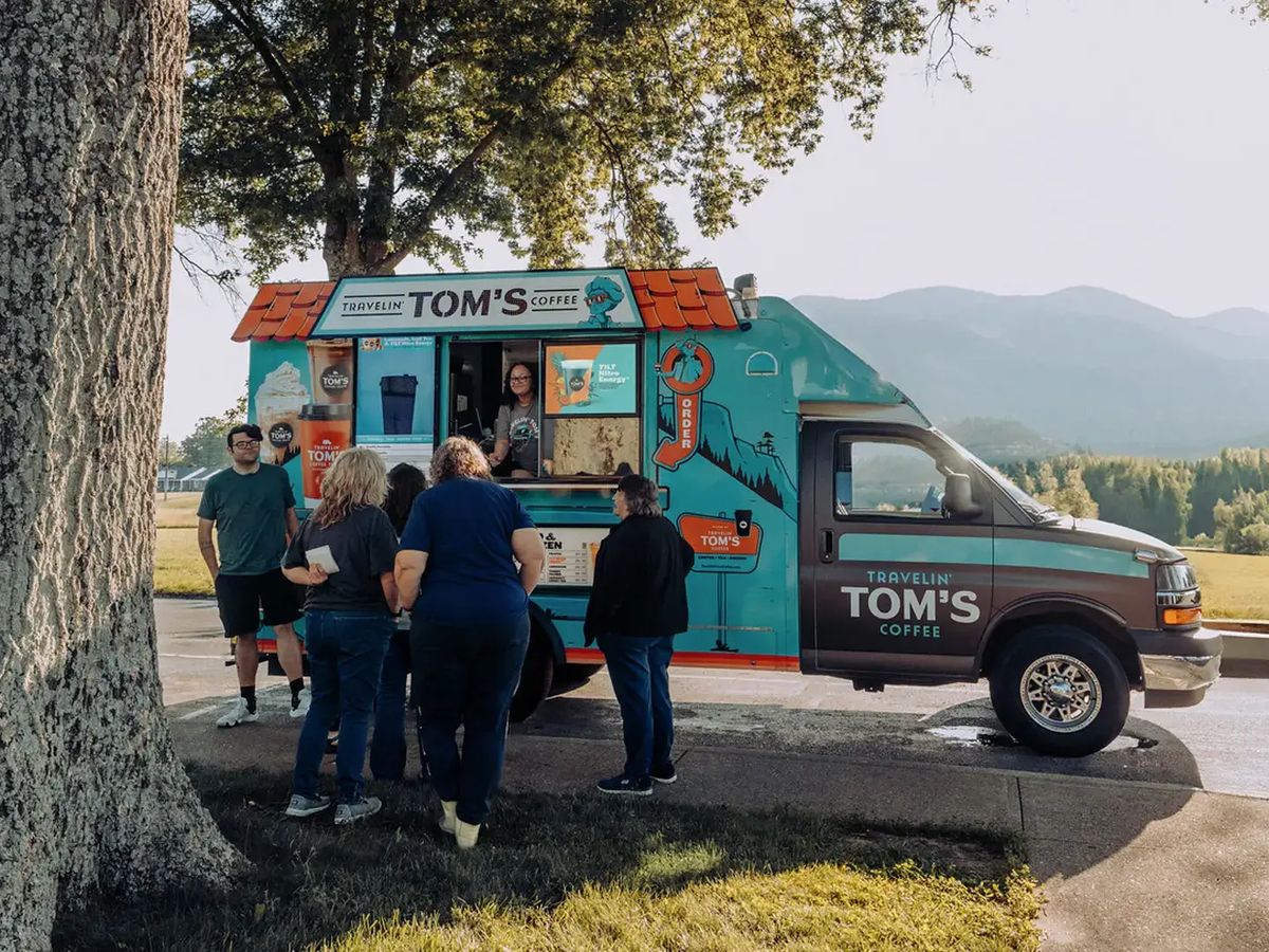 Travelin' Tom's Coffee truck serving guests